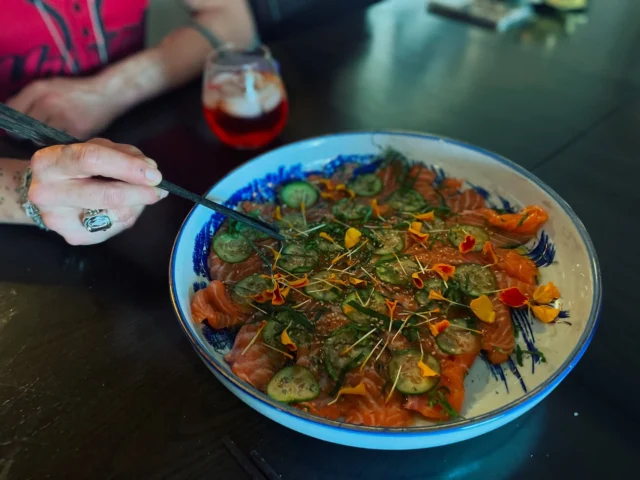 Salmon carpaccio, shaved cucumber, shaved shiso, local olive oil, truffle, black lava sea salt, marigold.Paired with a Negroni and a sunset that felt more Milan than Maui.This private dinner was designed to mirror the client herself—refined, playful, mysterious, and endlessly inspired.Mahalo @pandeia for inviting us to create an intimate experience for you that matches your world of curated beauty.We live for nights like these.✨ Private dining by Lotus Chefs | Rooted in Maui, styled for your spirit#LotusChefs #PrivateChefMaui #MauiDining #EdibleElegance #FarmToTableHawaii #Carpaccio #MauiLuxury #PandeiaVision #StyledByNature #MoodyVibes #DesignMeetsCuisine #MauiPrivateChef #MauiEvents #EatBeautifully